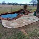 moss rock pond and patio